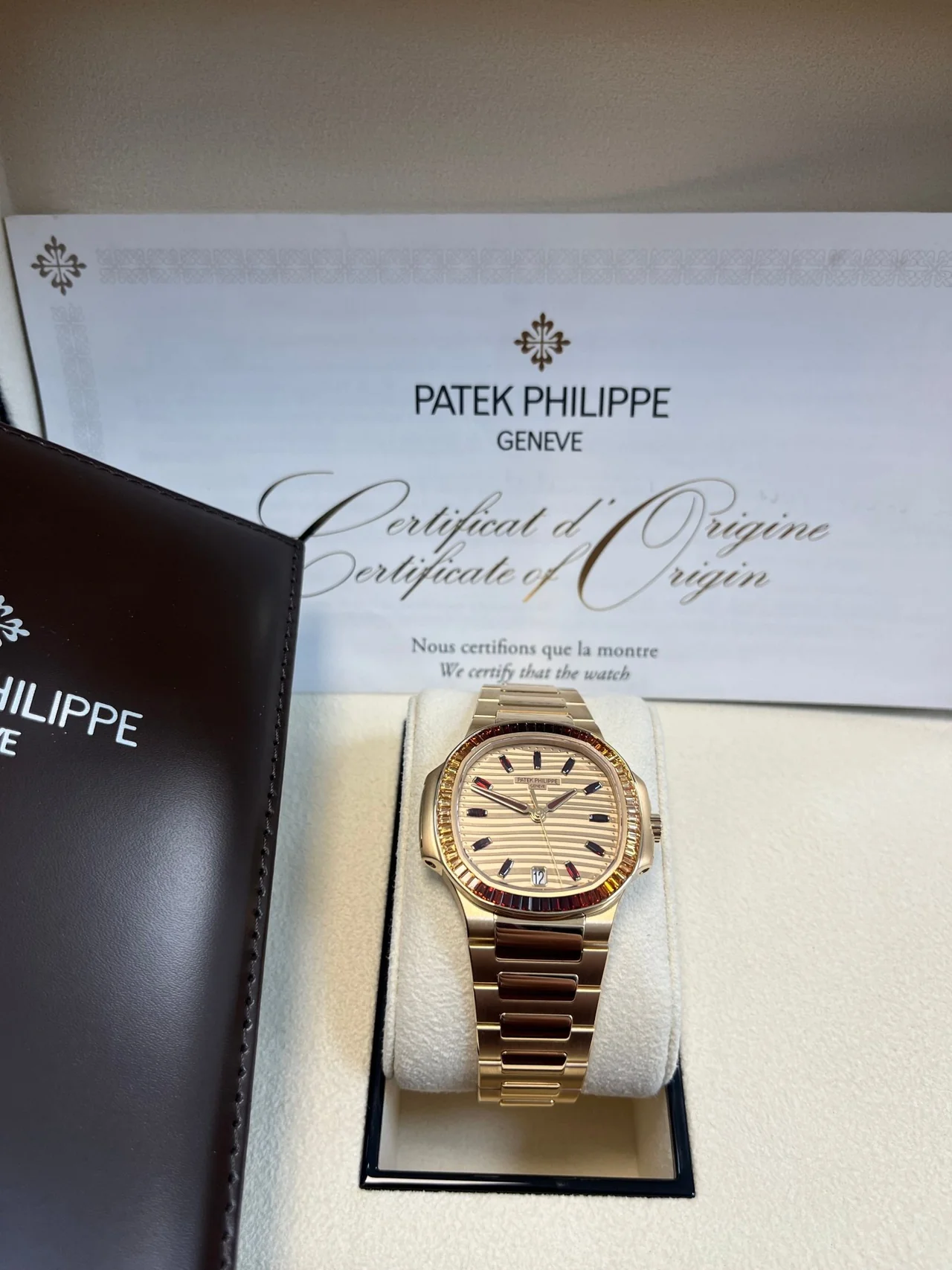 patek-philippe-nautilus-automatic-rose-gold-baguette-cognac-bezel-71181300r-001-829151_1280x.webp